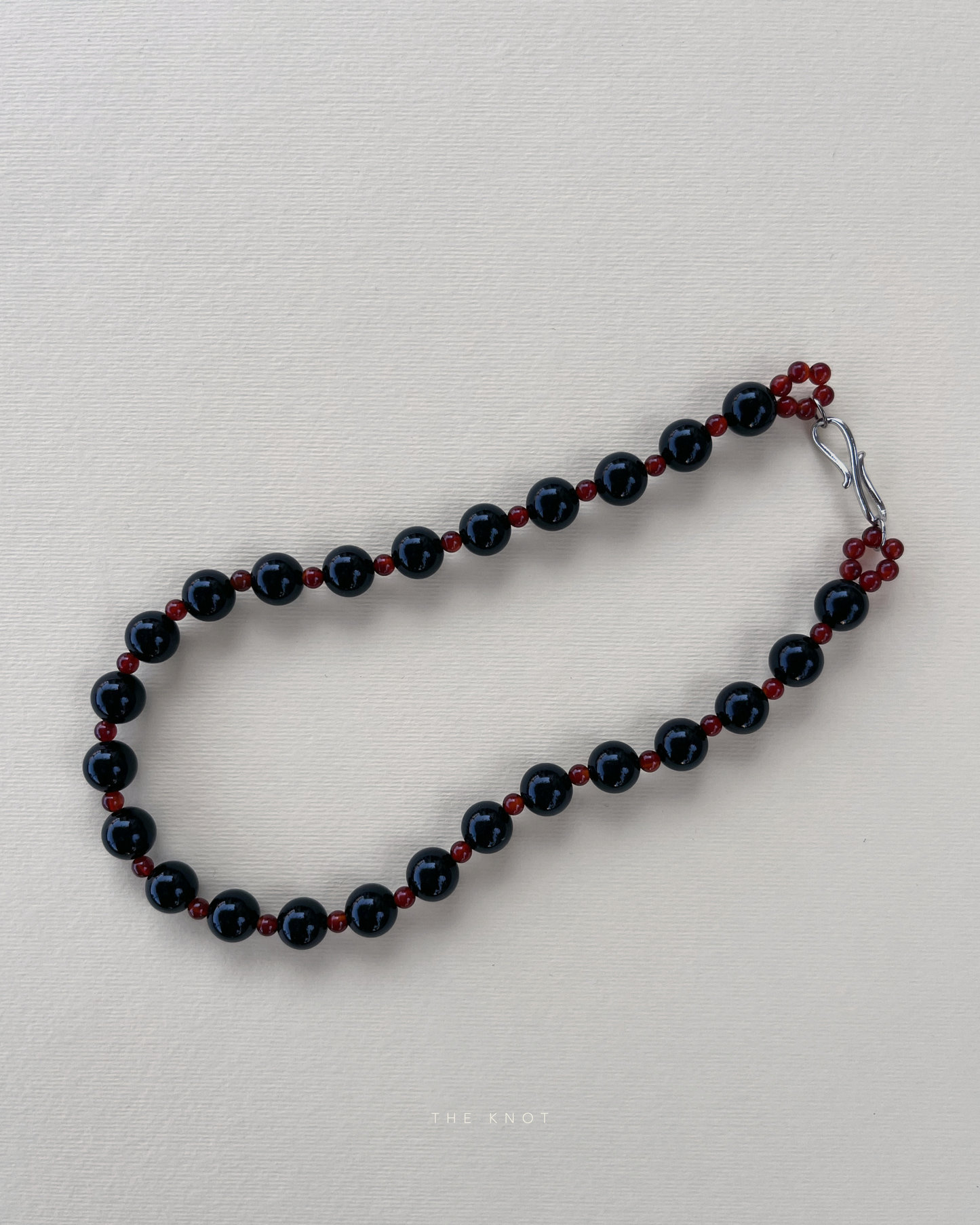 STRUNG TERRA008 - obsidian / carnelian