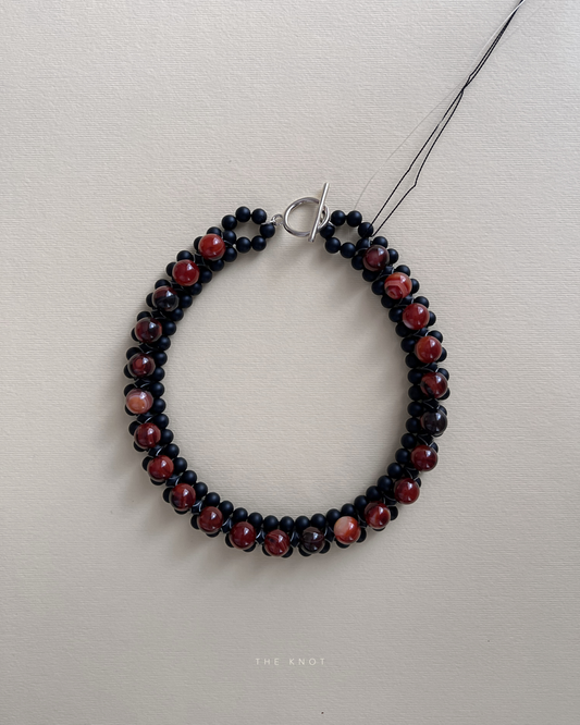 STRUNG D006 - black matte agate / red striped agate