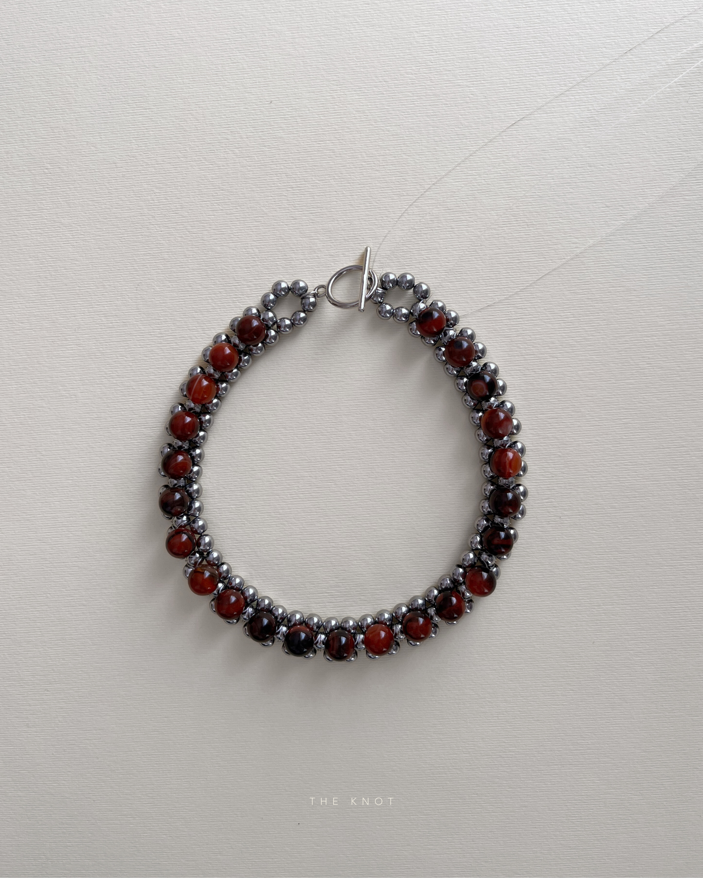 STRUNG D005 - silver hematite / red striped agate