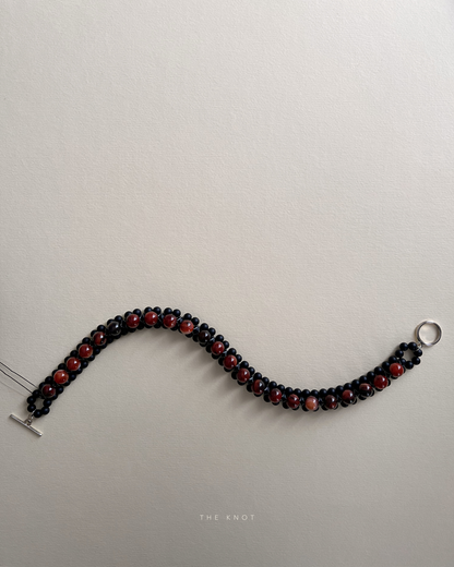 STRUNG D006 - black matte agate / red striped agate
