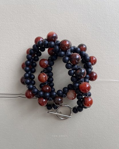 STRUNG D006 - black matte agate / red striped agate