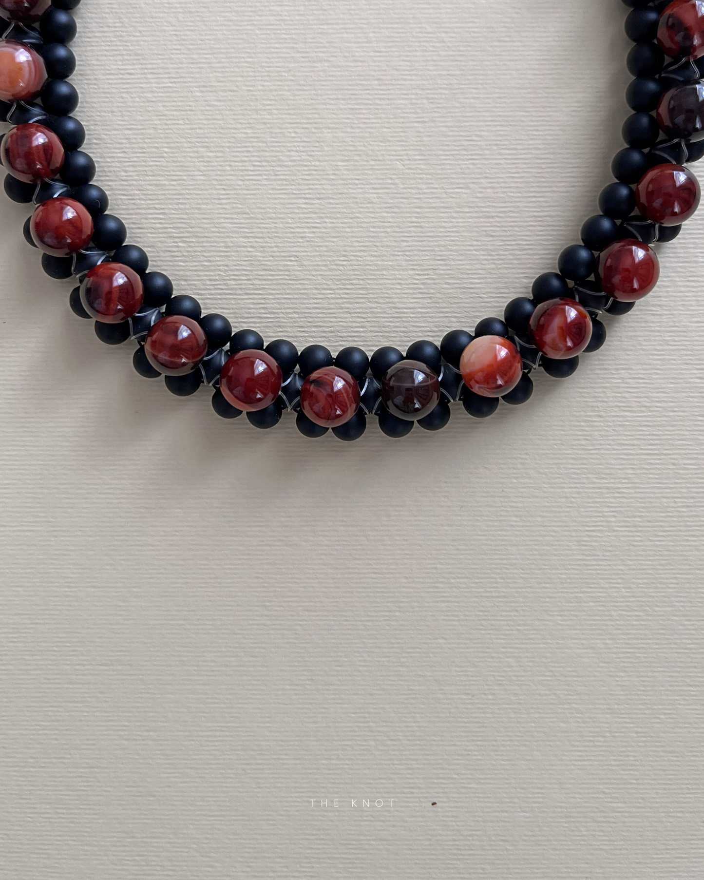 STRUNG D006 - black matte agate / red striped agate