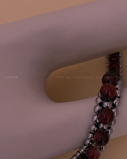 STRUNG D005 - silver hematite / red striped agate