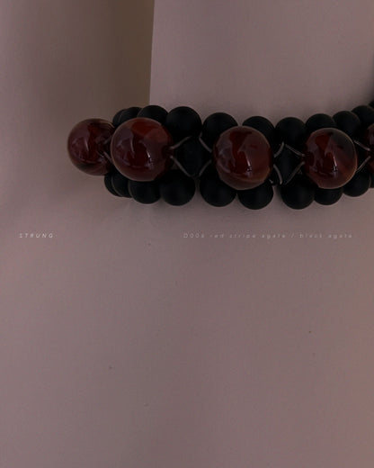 STRUNG D006 - black matte agate / red striped agate