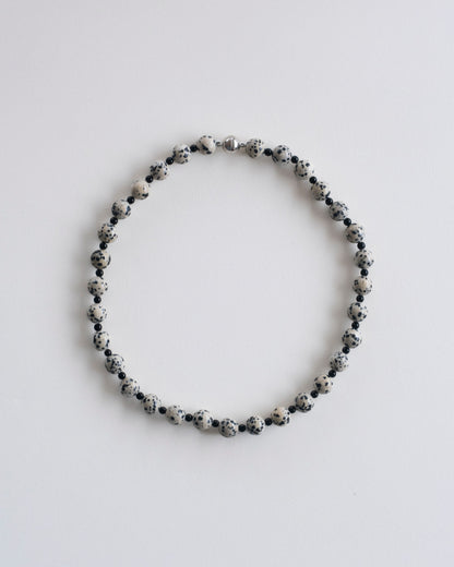 flat view of dalmatian jasper and onyx beaded necklace