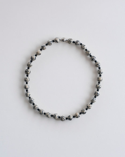 flat view of dalmatian jasper and onyx beaded necklace